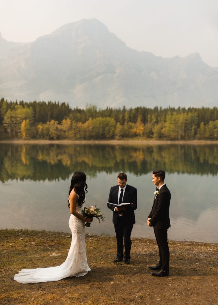 A beautiful location in Banff, Alberta, Canada, for an intimate wedding or elopement. Fall colours and calm water create a perfect reflection of the mountains.